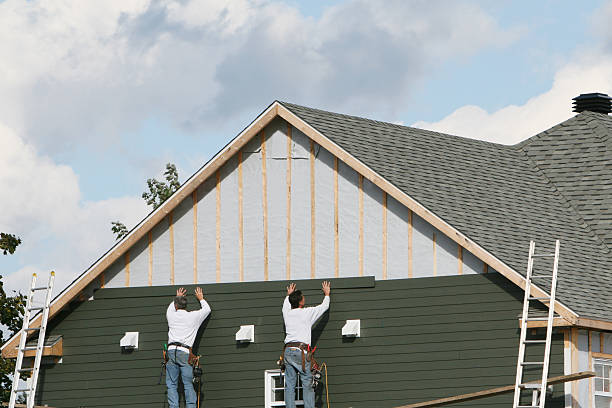Professional Siding Installation technician working in Harrison, NY